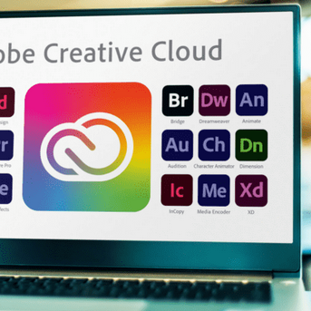 Logo von Adobe Creative Cloud mit App-Symbolen auf einem Laptop-Bildschirm.